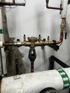 Backflow assembly installed on commercial plumbing system in Spokane
