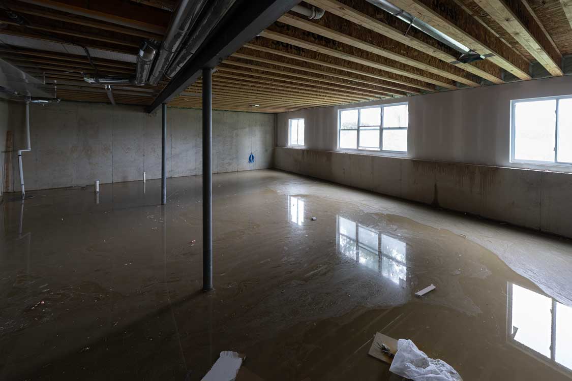A basement of flooded water after a sump pump did not work properly