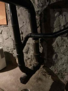 Aging cast iron drain line in the basement