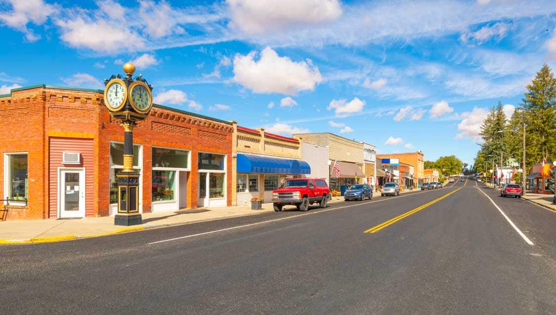 A small strip of businesses in a typical Spokane area town