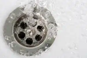 Water flowing down a quick drain