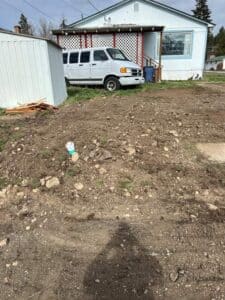 Yard after sewer line replacement in Spokane WA with minimal surface disruption