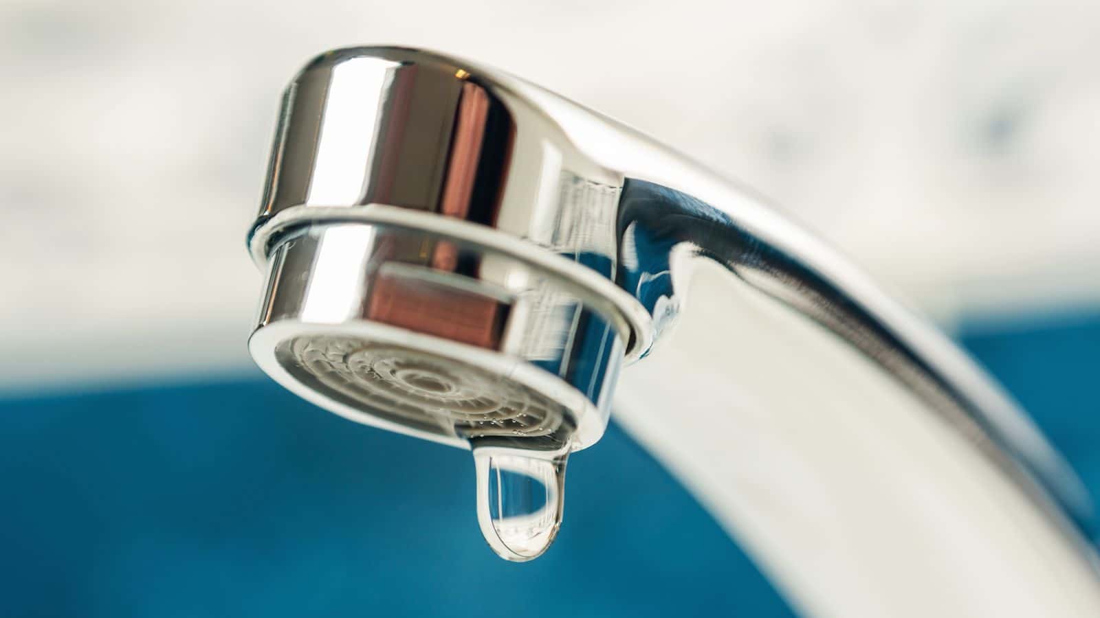 A sink faucet dripping