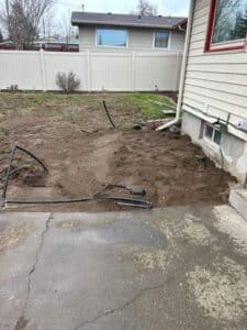 Sewer line replacement work in Spokane WA near home foundation