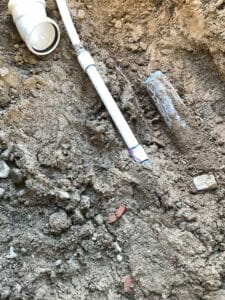 New PVC sewer pipe installed during drain repair in Grand Coulee WA
