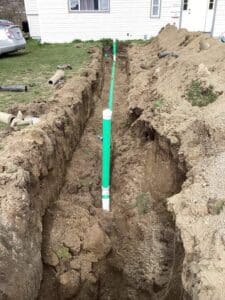Yard opened to access and repair the damaged drain line