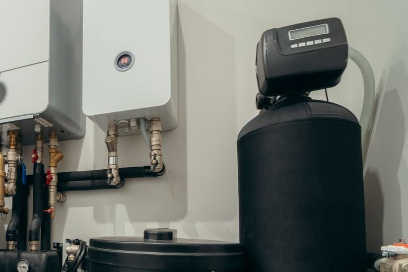 Water softener and tankless water heater installed in a home