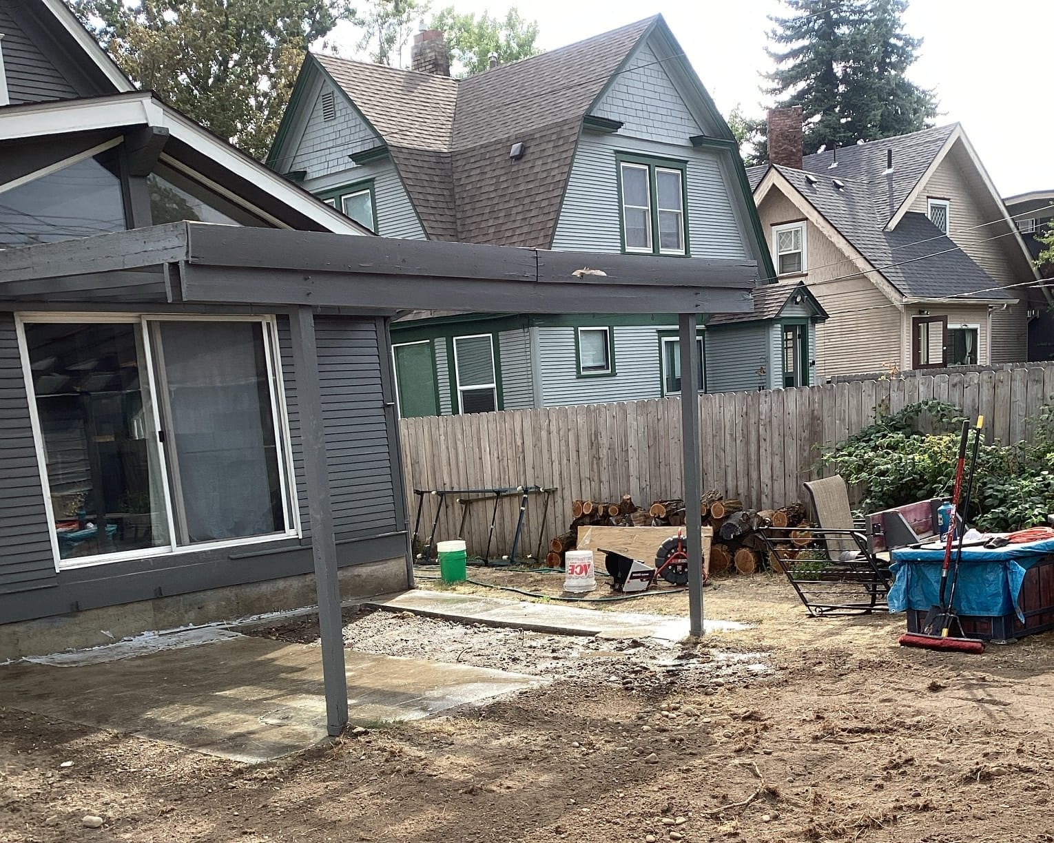 The backyard of a home after trenchless excavation work to reline a pipe